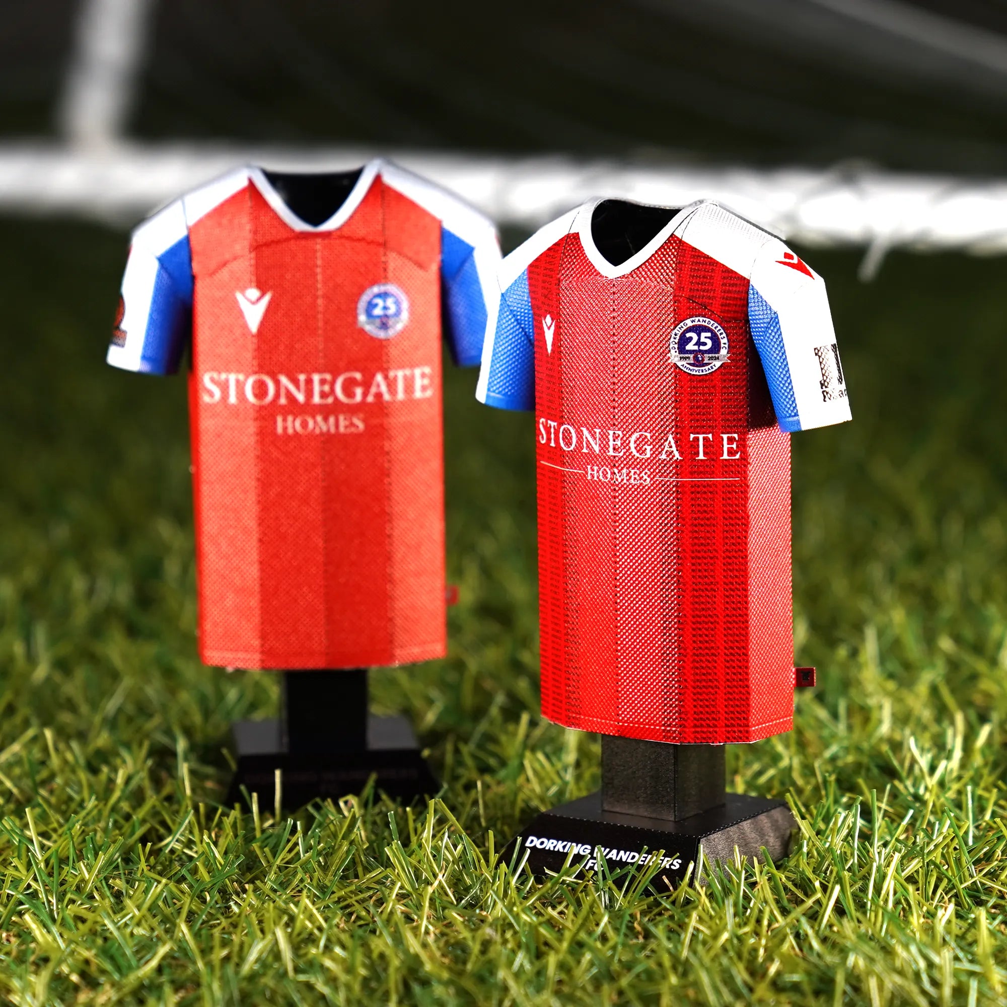 Dorking Wanderers Metal Jersey on grass pitch